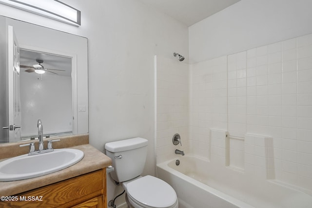 full bath featuring washtub / shower combination, vanity, toilet, and a ceiling fan