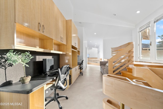 office space with concrete floors, vaulted ceiling, and recessed lighting