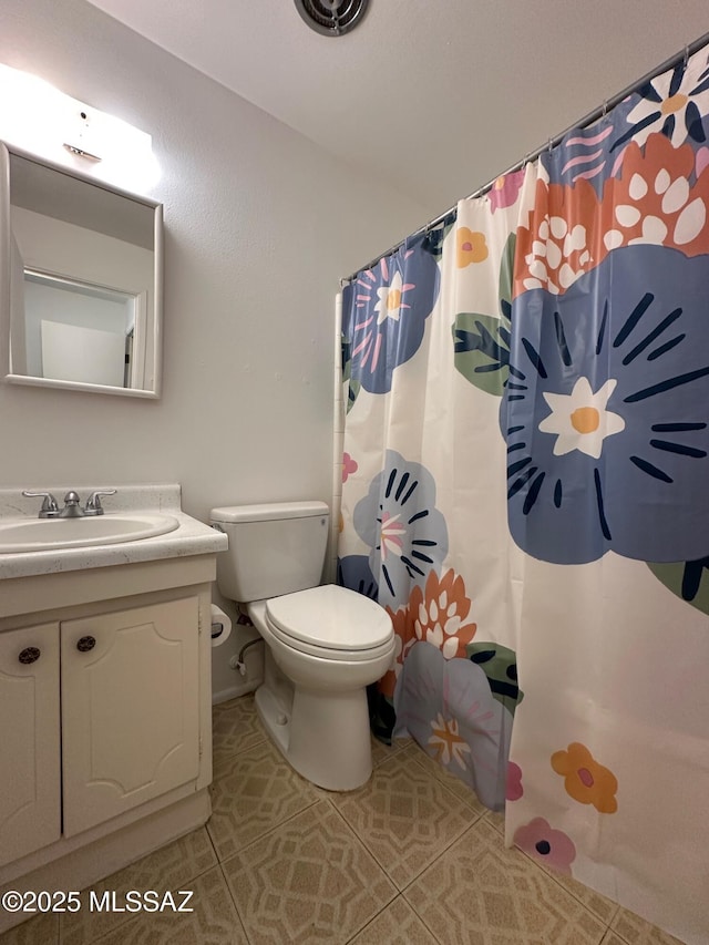full bath featuring toilet, a shower with curtain, tile patterned flooring, and vanity