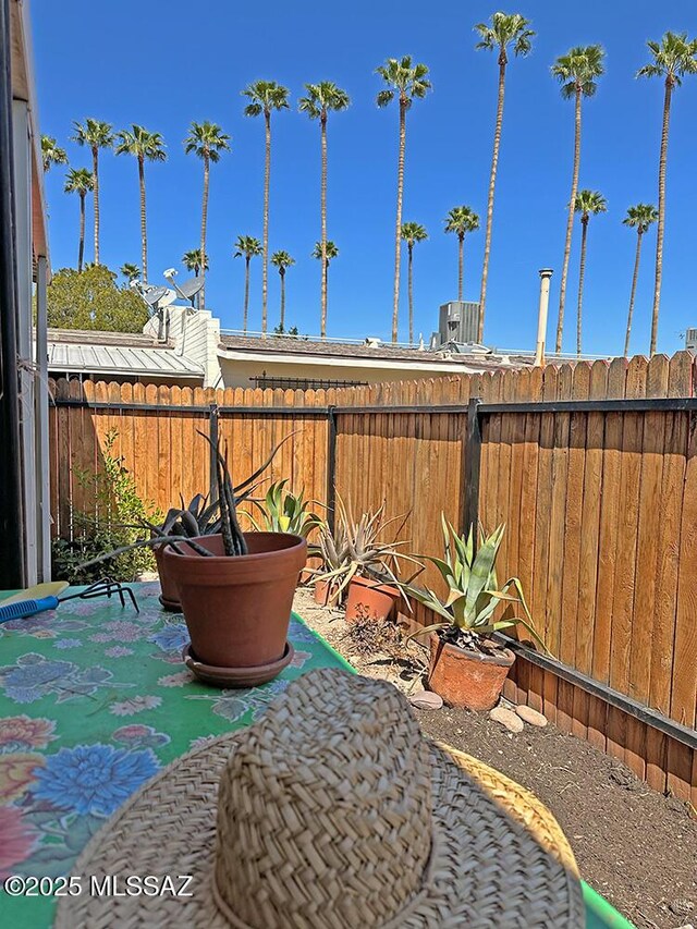 view of patio / terrace featuring fence