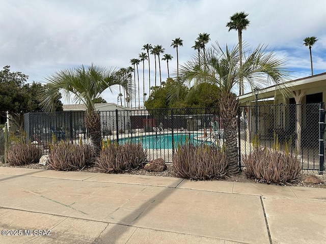 pool featuring fence