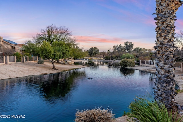 view of water feature featuring fence