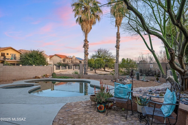 view of pool with a patio, fence, and a fenced in pool