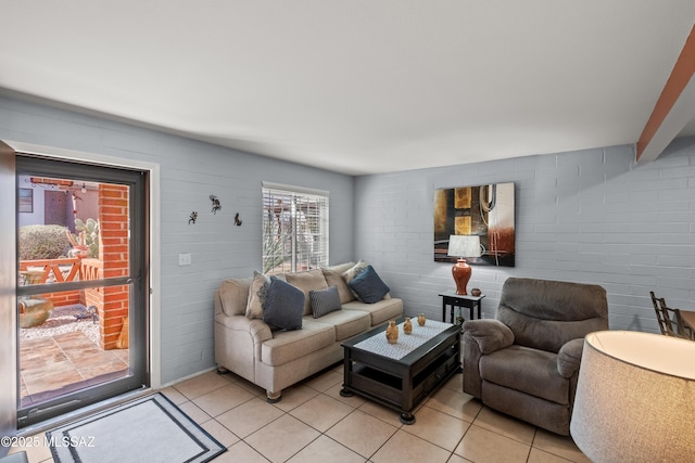 living area with light tile patterned floors