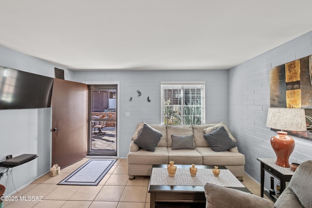 living area with light tile patterned floors