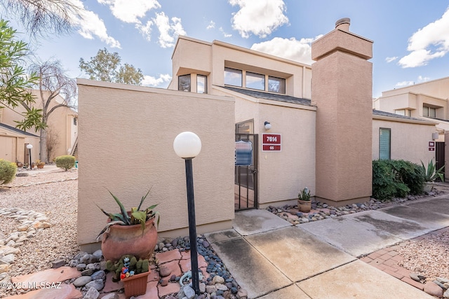 exterior space with stucco siding