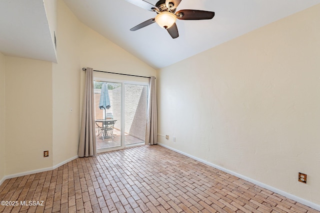 unfurnished room featuring ceiling fan, baseboards, lofted ceiling, and brick floor