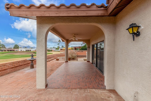 view of patio / terrace with a ceiling fan