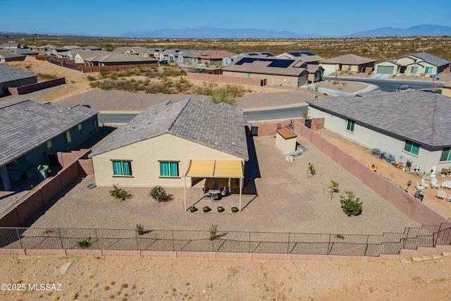 bird's eye view with a mountain view and a residential view