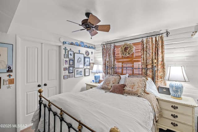 bedroom featuring a ceiling fan and a closet