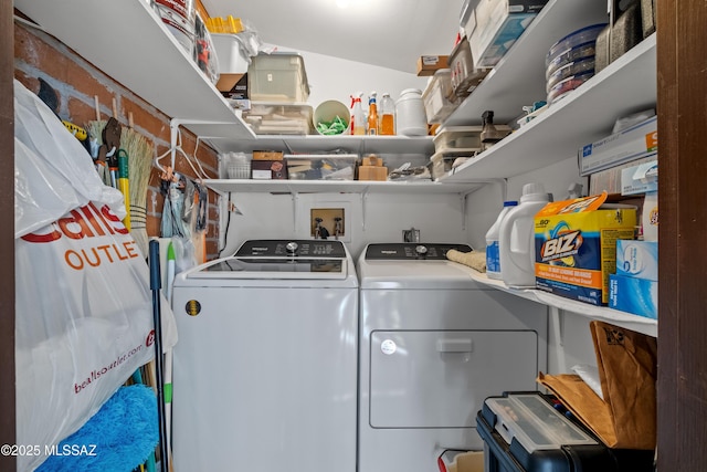 laundry area with laundry area and washer and clothes dryer