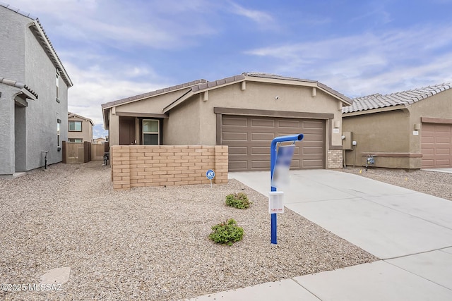 ranch-style home with an attached garage, brick siding, driveway, a tiled roof, and stucco siding