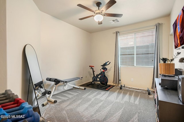 workout area featuring ceiling fan, carpet flooring, and visible vents