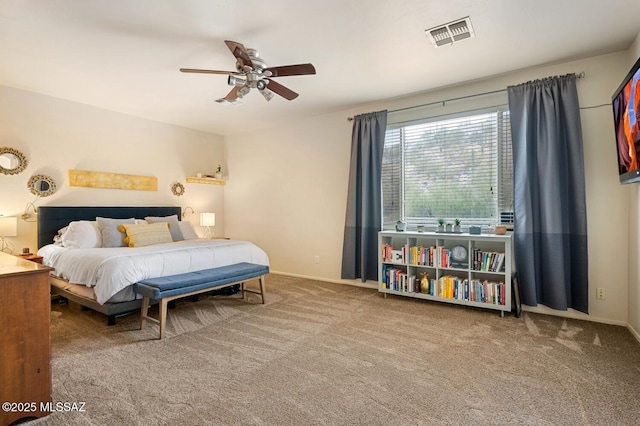 bedroom with a ceiling fan, carpet flooring, visible vents, and baseboards