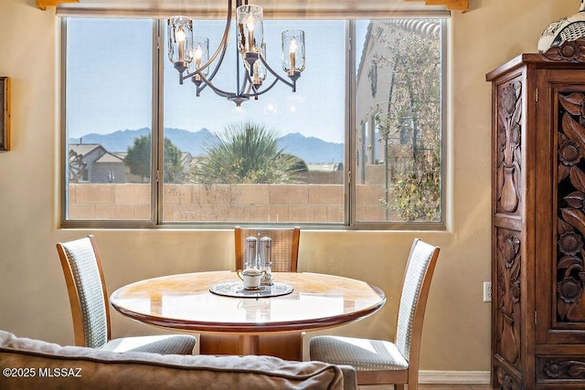 dining room with a notable chandelier