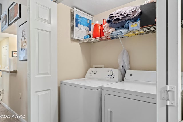 101 S Players Club Dr Unit 11202, Tucson, AZ 85745 - washroom featuring laundry area, separate washer and dryer, and baseboards