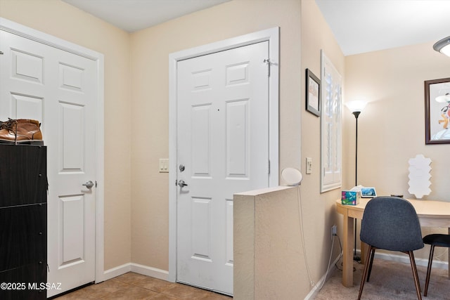 101 S Players Club Dr Unit 11202, Tucson, AZ 85745 - foyer entrance featuring tile patterned flooring and baseboards