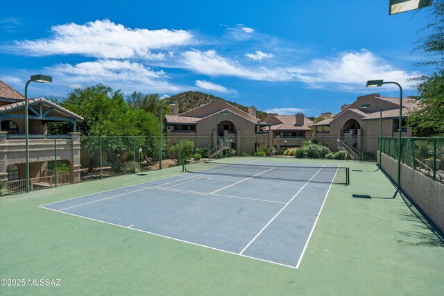 101 S Players Club Dr Unit 11202, Tucson, AZ 85745 - view of tennis court featuring a residential view and fence