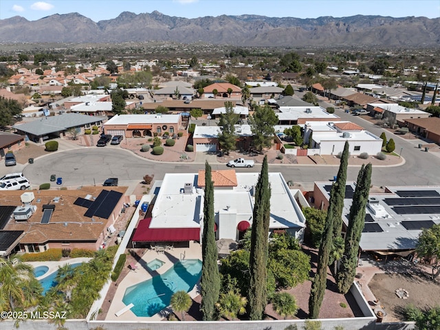 drone / aerial view featuring a mountain view and a residential view