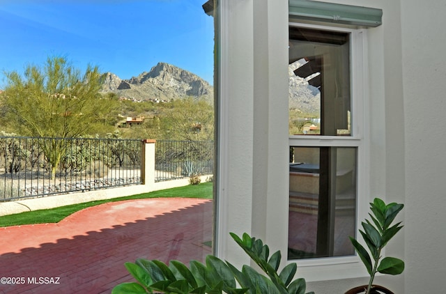 doorway to outside with a mountain view