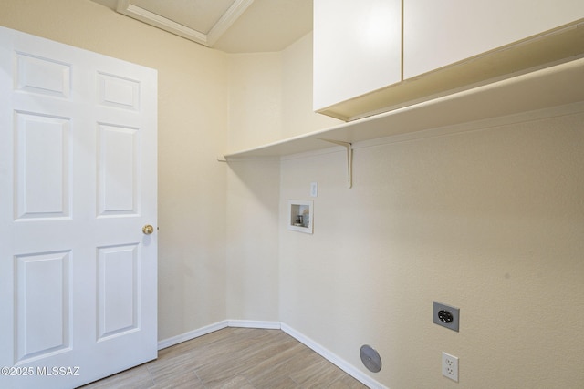 clothes washing area featuring washer hookup, light wood-style flooring, electric dryer hookup, laundry area, and baseboards