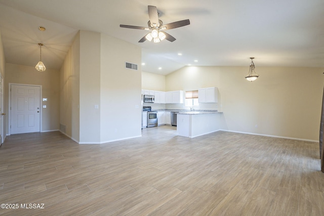 unfurnished living room featuring visible vents, a ceiling fan, high vaulted ceiling, light wood-type flooring, and baseboards