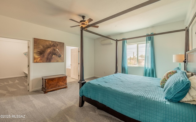 bedroom featuring a ceiling fan, carpet flooring, baseboards, and a wall mounted AC