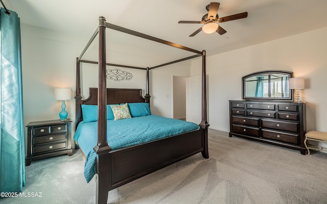 carpeted bedroom featuring a ceiling fan