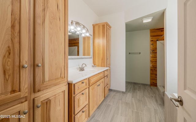 bathroom with radiator heating unit and vanity