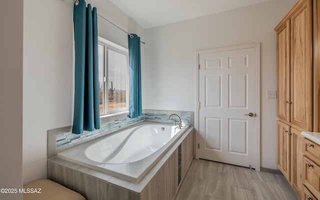 bathroom featuring a garden tub