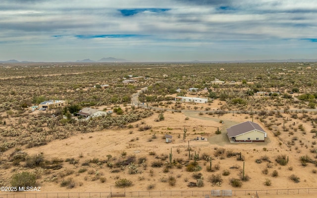 aerial view with view of desert and a mountain view