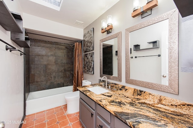 full bath with shower / bath combo, tile patterned flooring, vanity, and toilet