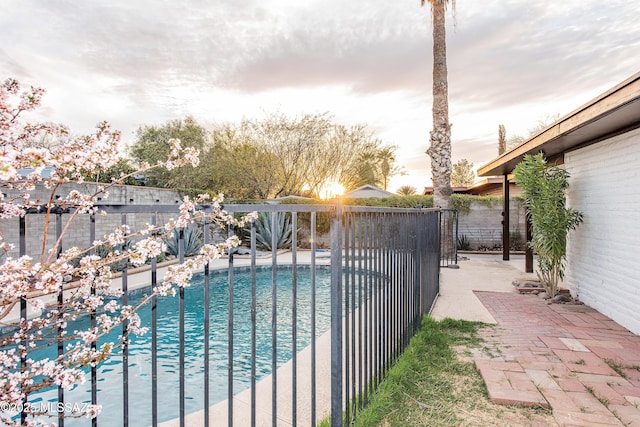 view of pool featuring a fenced in pool, a patio, and fence