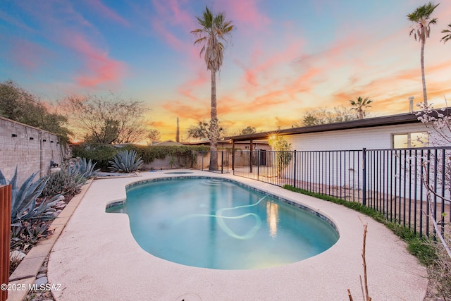 view of swimming pool featuring a fenced backyard and a fenced in pool