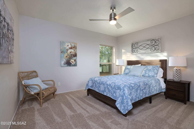 bedroom featuring a ceiling fan and carpet
