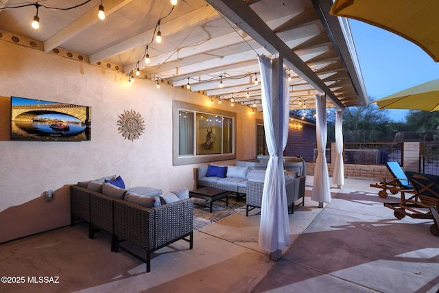 view of patio / terrace featuring outdoor lounge area and fence