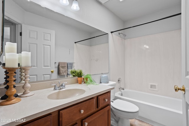 full bath with vanity, toilet, and shower / bathtub combination