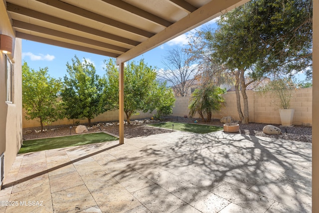 view of patio with a fenced backyard