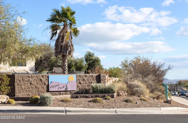 view of community sign