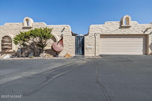 view of front of house with a garage and driveway