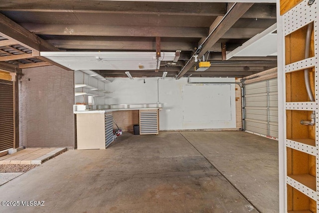 garage featuring a garage door opener