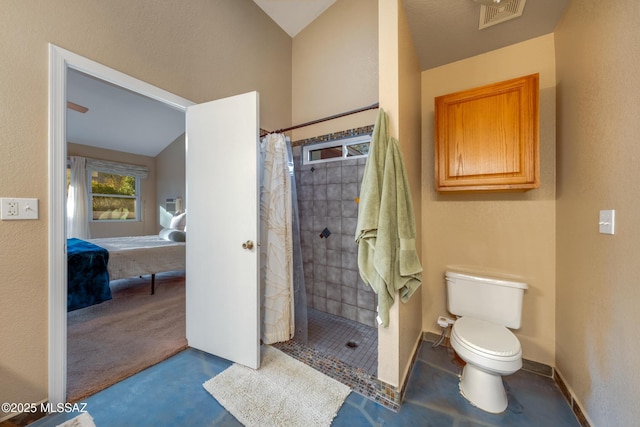 10117 E Sky Castle Way, Tucson, AZ 85730 - bathroom with connected bathroom, toilet, visible vents, and tiled shower