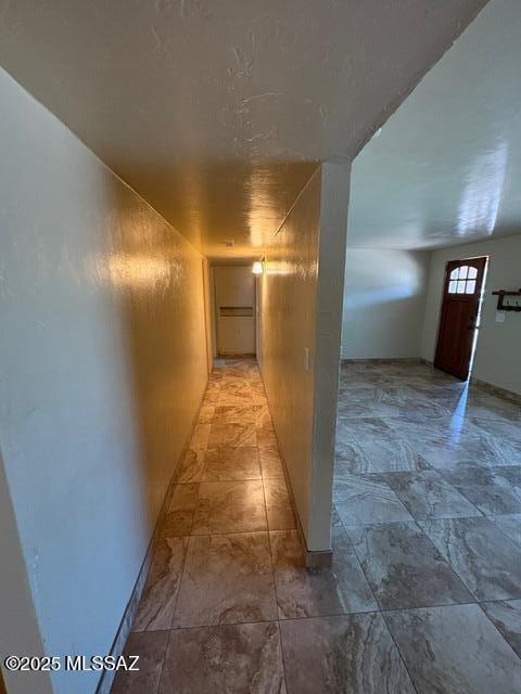 302 W Aragon Rd, Tucson, AZ 85756 - corridor featuring baseboards