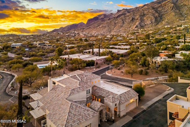 drone / aerial view featuring a mountain view