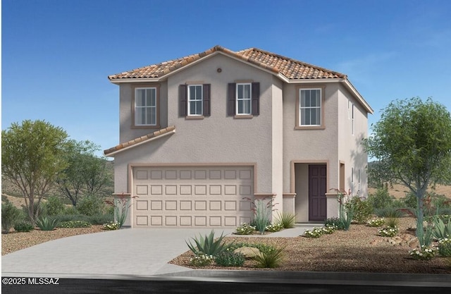 mediterranean / spanish-style home featuring driveway, an attached garage, a tile roof, and stucco siding