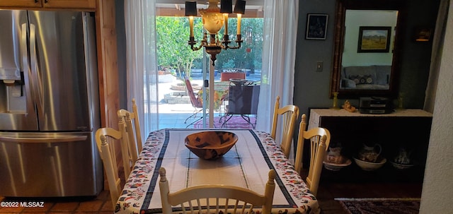 dining area with a chandelier