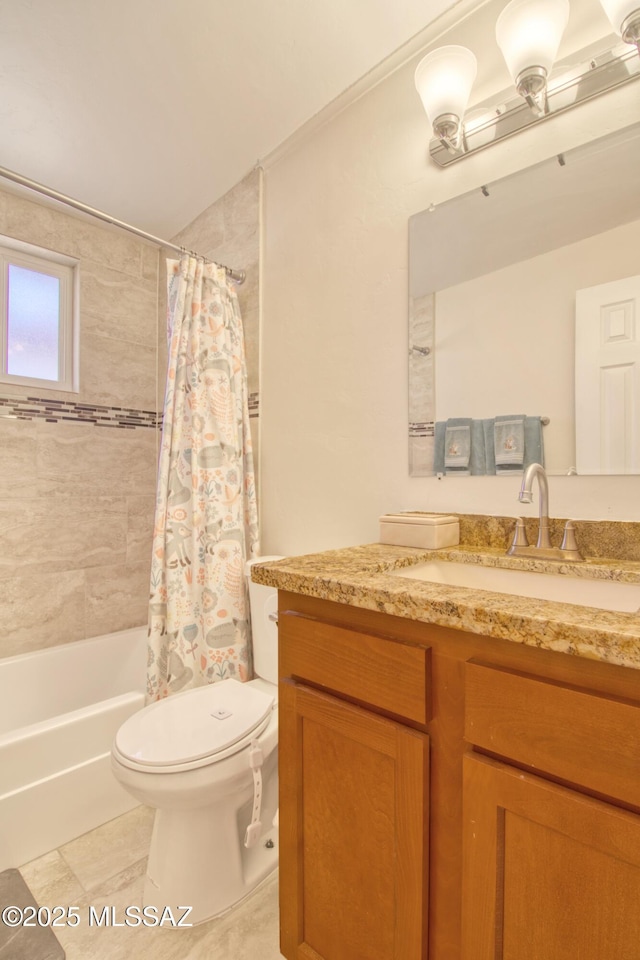 bathroom with tile patterned flooring, shower / bath combo, vanity, and toilet