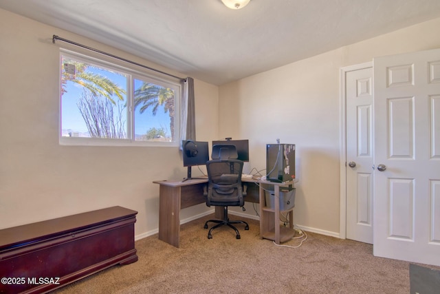 carpeted office with baseboards