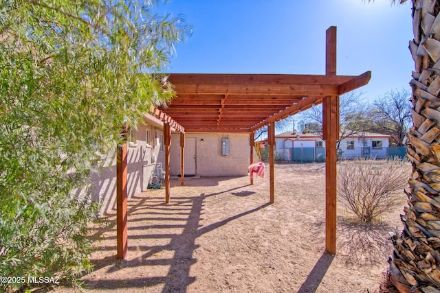 view of patio / terrace with a fenced backyard and a pergola