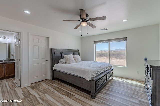 bedroom featuring recessed lighting, baseboards, visible vents, and light wood finished floors